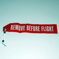 Attache remove before flight - plastic 30x7.5cm